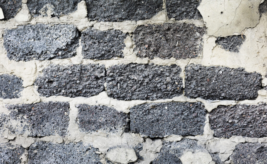 Close-up of rough concrete block wall